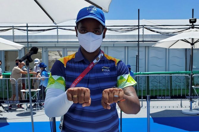 Indian archer Atanu Das shows his wedding ring and Olympics ring after shocking two-time Olympic champion Oh Jin Hyek in the men’s individual event at the Tokyo Olympics on Thursday.