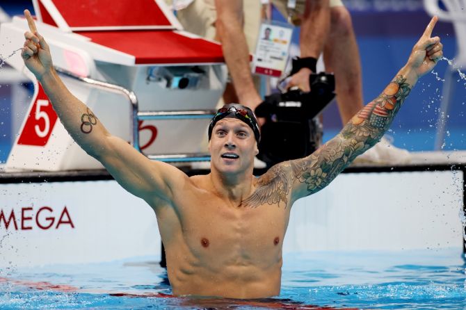 Caeleb Dressel of the United States celebrates after winning the Olympics men's 100m freestyle final, at Tokyo Aquatics Centre, on Thursday.