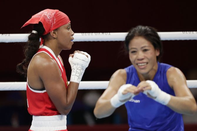 India's M C Mary Kom reacts after losing to Colombia's Ingrid Valencia in the Olympics women's flyweight last 16 bout, at Kokugikan Arena in Tokyo, on Thursday.