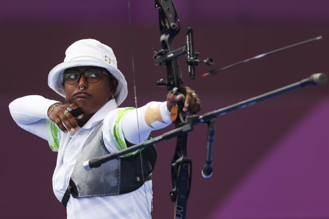 India's Deepika Kumari competes in the Olympics women's Individual 1/8 archery eliminations, at Yumenoshima Park Archery Field in Tokyo, on Friday. 