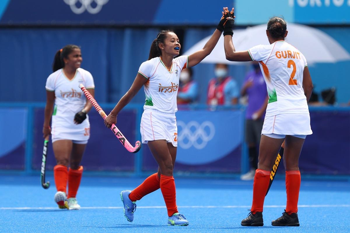 Sushila Chanu Pukhrambam and Gurjit Kaur celebrate India's goal during the Olympics women's Pool A hockey match against Ireland, at Oi Hockey stadium in Tokyo, on Friday.