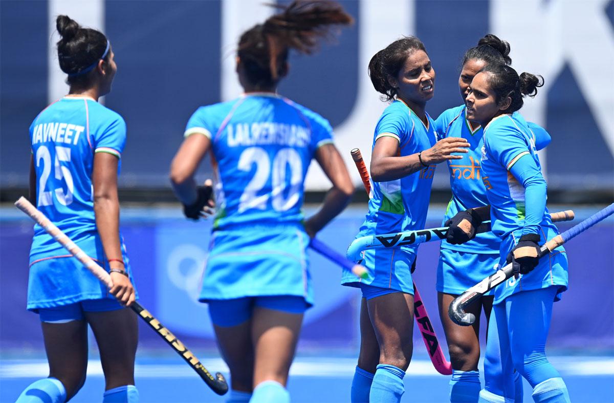 Vandana Katariya celebrates with teammates after scoring