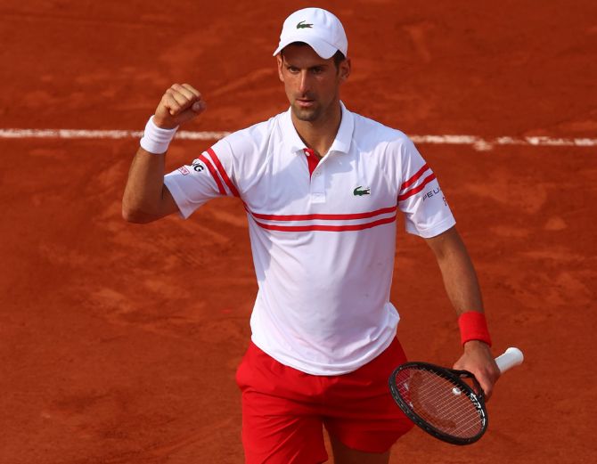 Serbia's Novak Djokovic celebrates winning his second round match against Pablo Cuevas of Uruguay