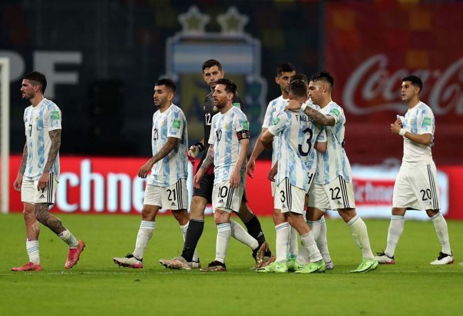 Argentina's Lionel Messi and teammates look dejected after the match against Chile at Estadio Unico, Santiago del Estero in Argentina on Thursday 