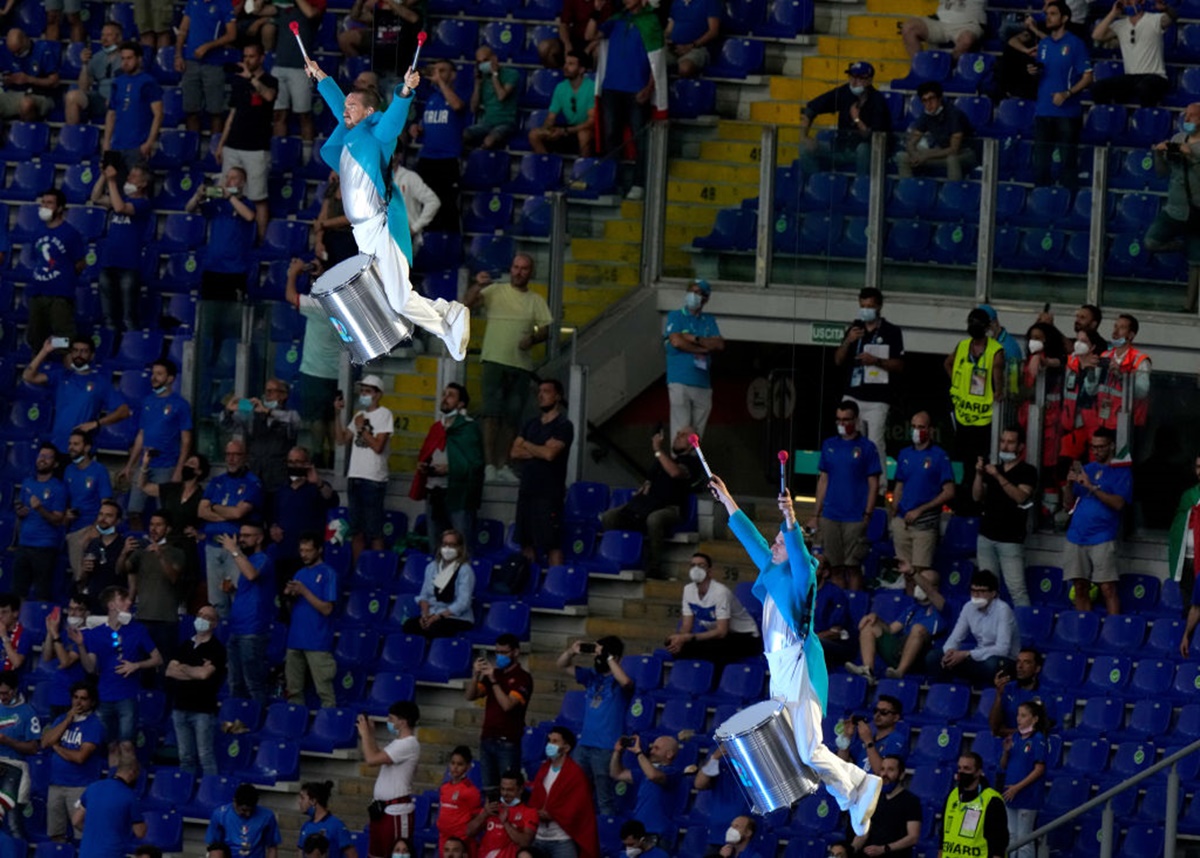 Trapeze artists perform at the opening ceremony.