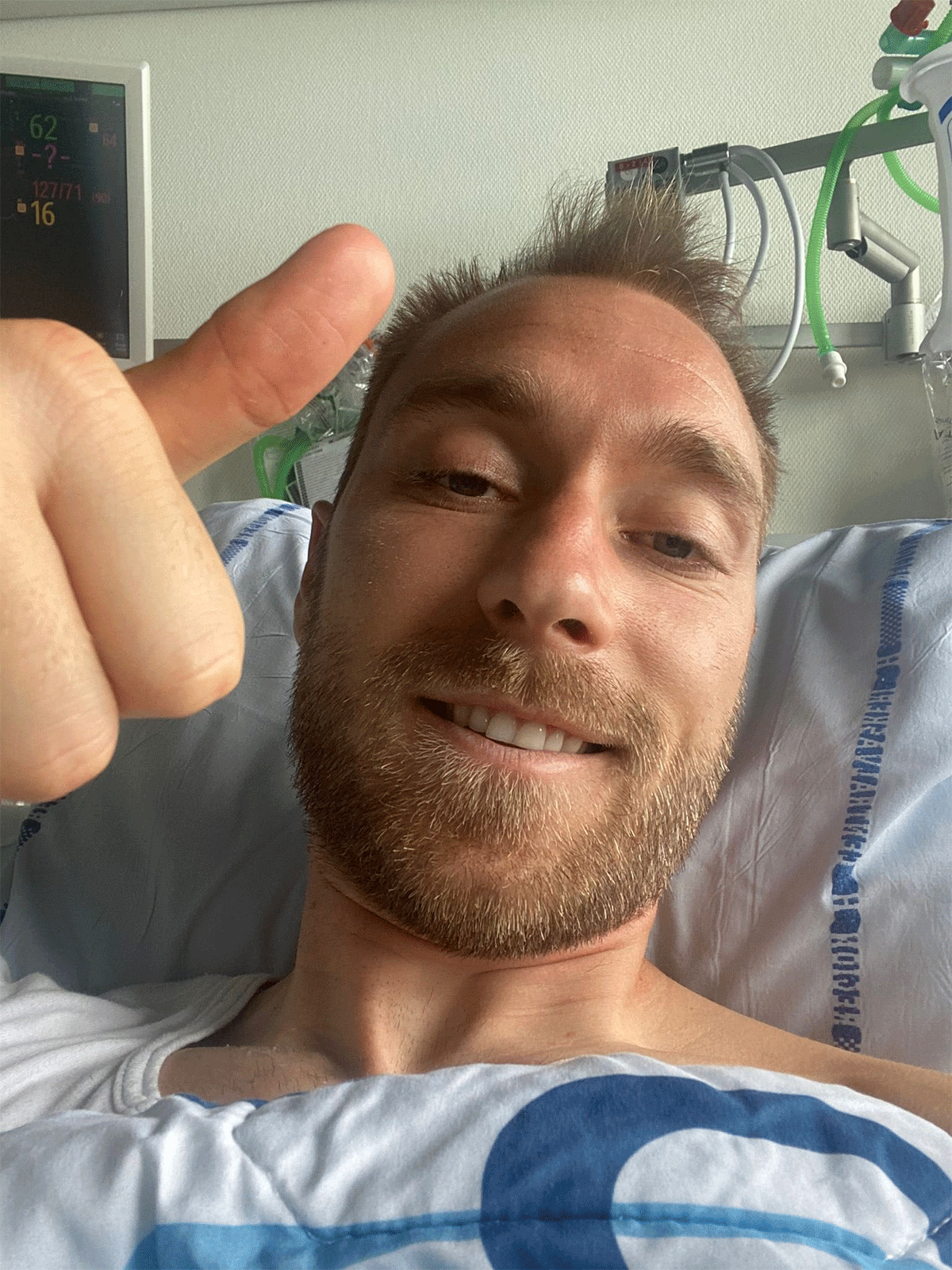 Christian Eriksen gives a thumbs up from his hospital bed 