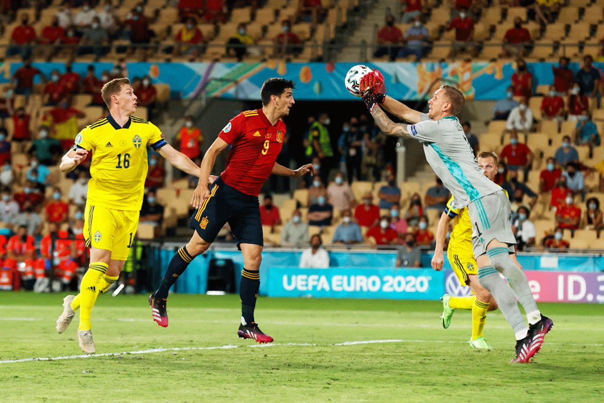 Spain's Gerard Moreno forces a late save from Sweden's keeper Robin Olsen during their UEFA Euro 2020 Championship Group E match at the La Cartuja Stadium in Seville, Spain, on Monday