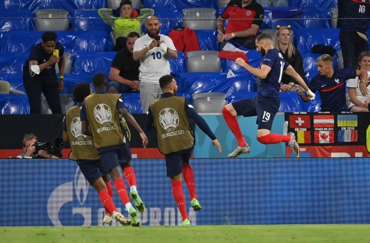 France's Karim Benzema celebrates scoring a goal, which was later disallowed for off-side