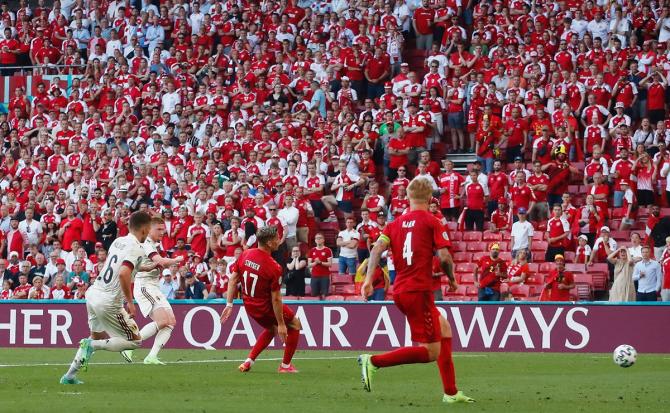 Kevin De Bruyne scores Belgium's second goal against Denmark.