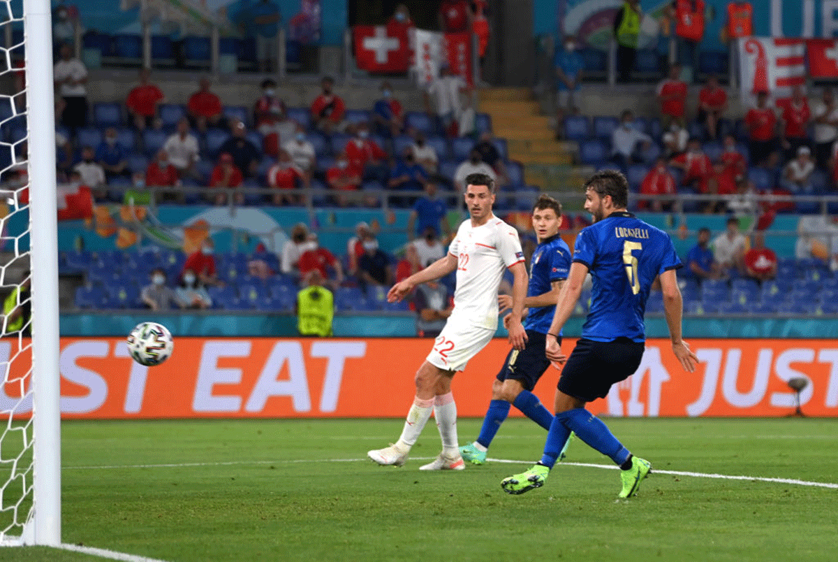 Italy's Manuel Locatelli scores the first goal against Switzerland at Olimpico Stadium in Rome, Italy, on Wednesday