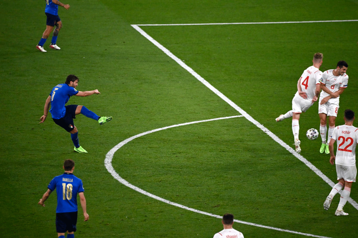 Italy's Manuel Locatelli scores their second goal