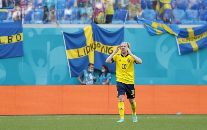 Sweden's Emil Forsberg celebrates after finding the net from the penalty spot