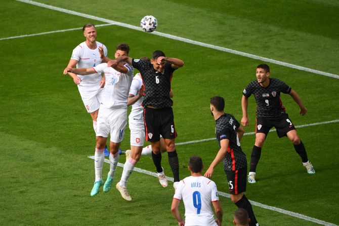 Croatia's Dejan Lovren strikes Patrik Schick in the face with his elbow while defending an aerial ball, leading to the penalty being awarded to the Czechs