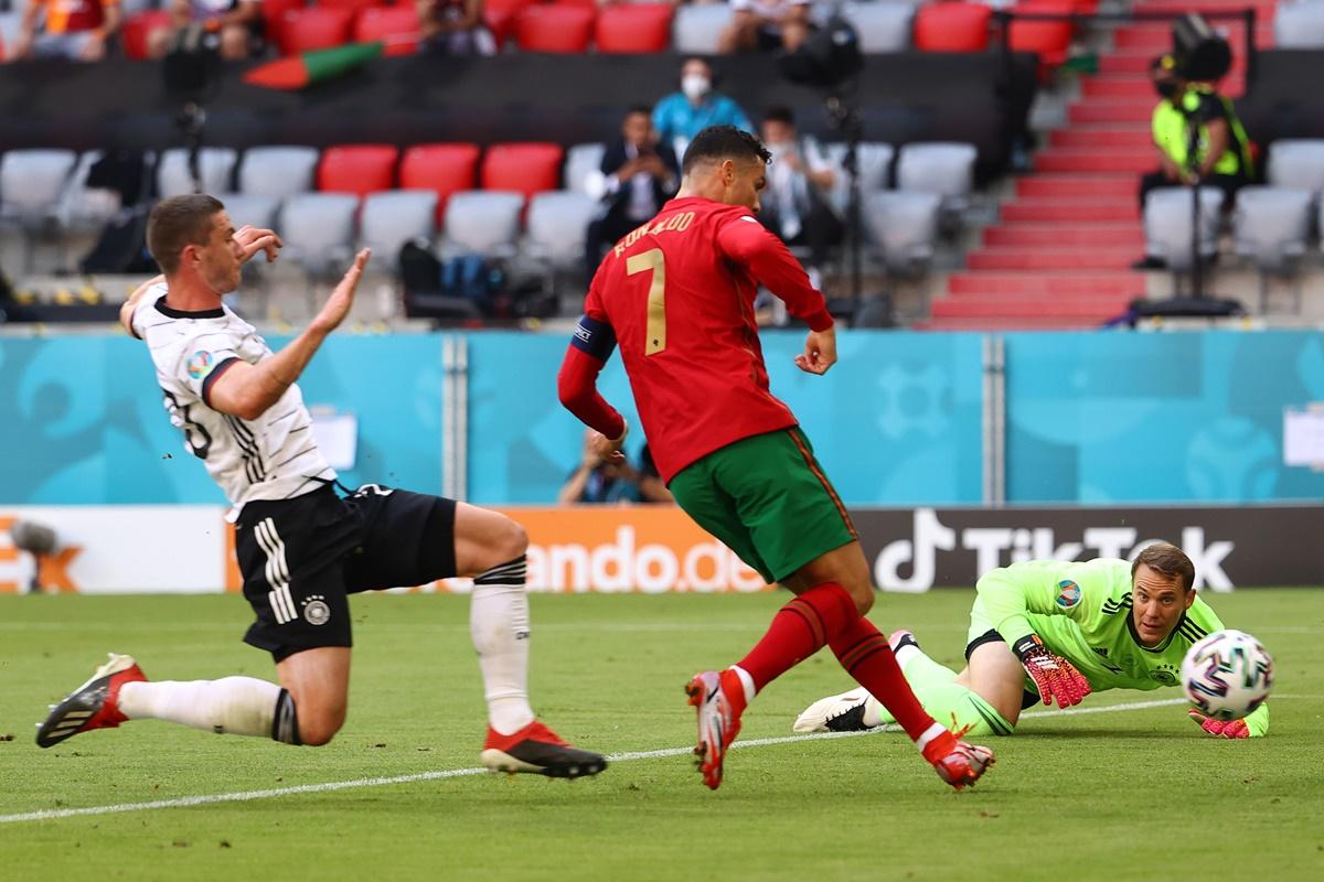 Germany goalkeeper Manuel Neuer watches as Cristiano Ronaldo scores to put Portugal ahead