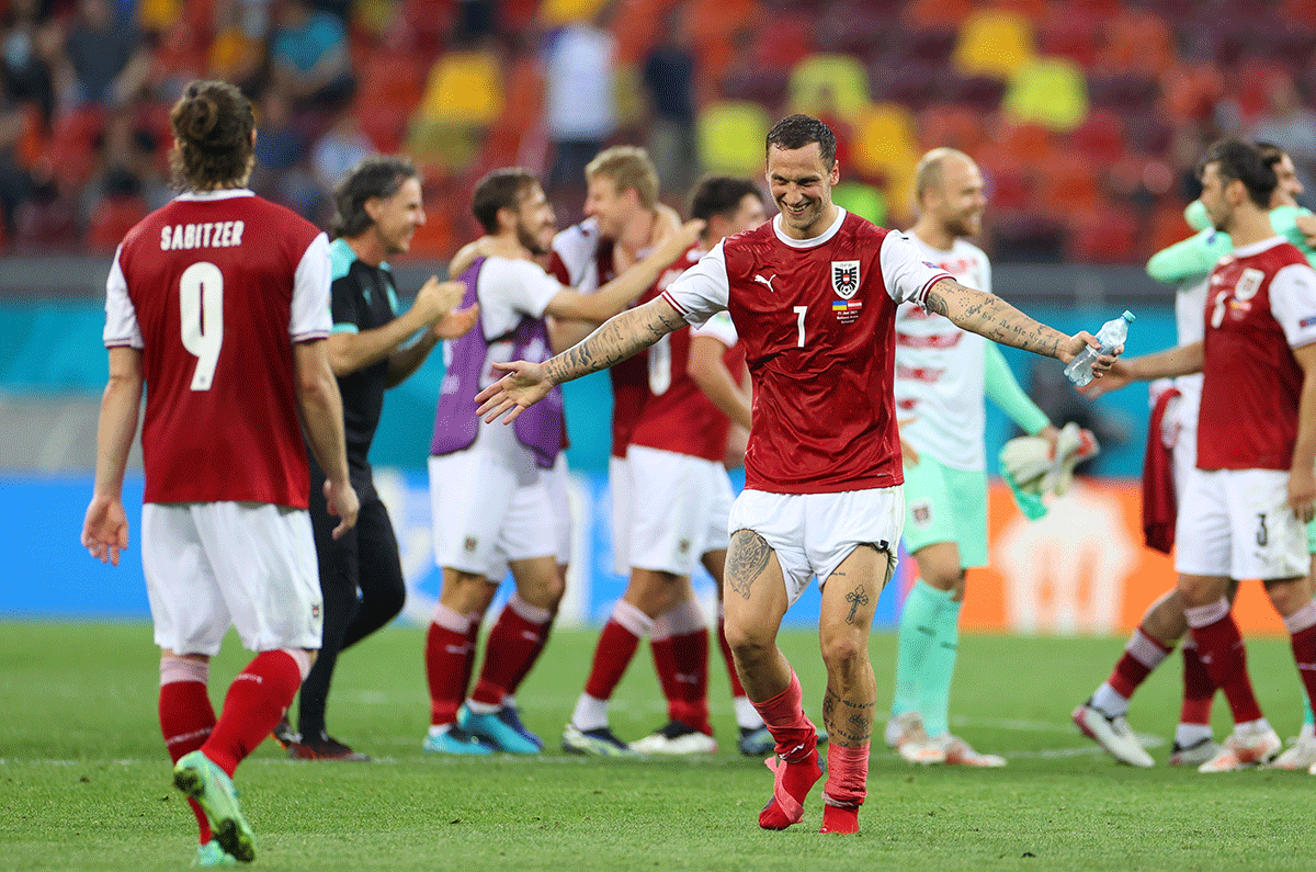 Austria's Marko Arnautovic celebrates after the match 