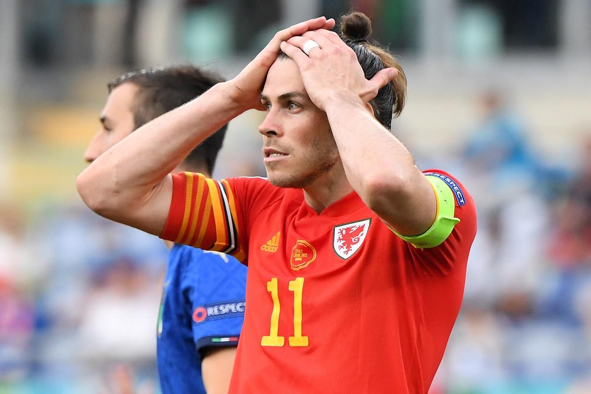 Wales striker Gareth Bale reacts after blasting the ball over the crossbar from close.