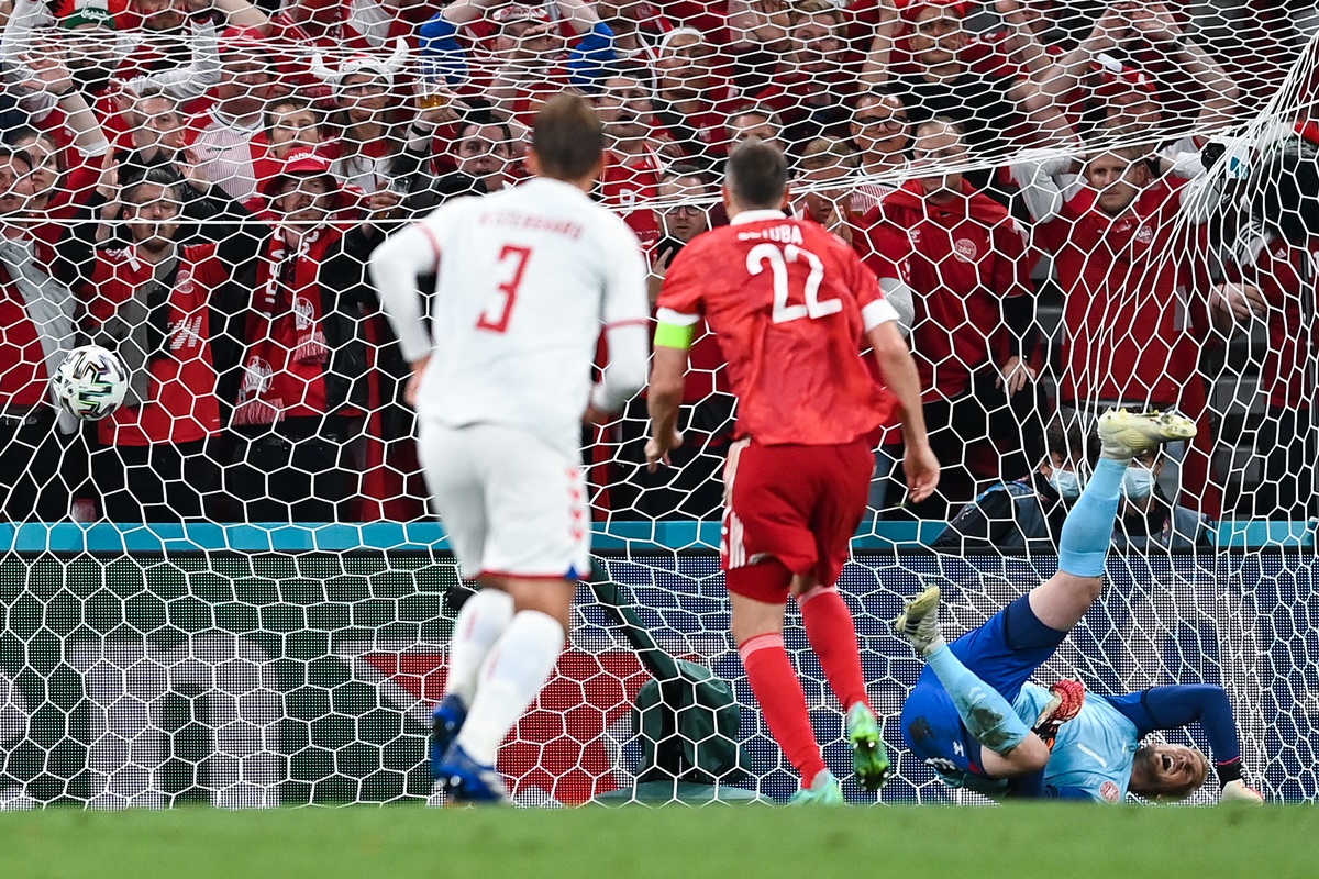 Russia's Artem Dzyuba scores from the penalty spot past Denmark goalkeeper  Kasper Schmeichel.