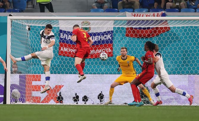 Belgium's Thomas Vermaelen heads on target before Finland goalkeeper Lukas Hradecky makes a mess of the collection and concedes and own goal. 