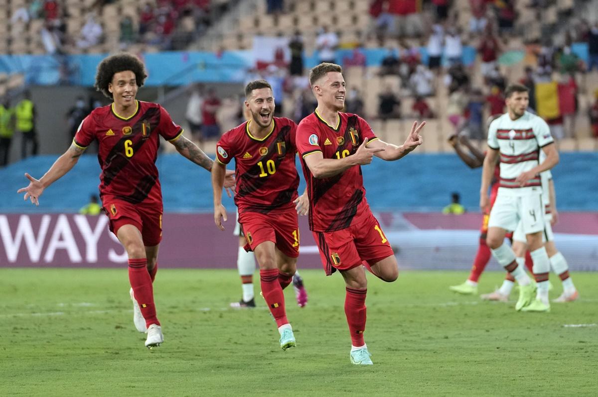 Thorgan Hazard, No. 16, celebrates after scoring.