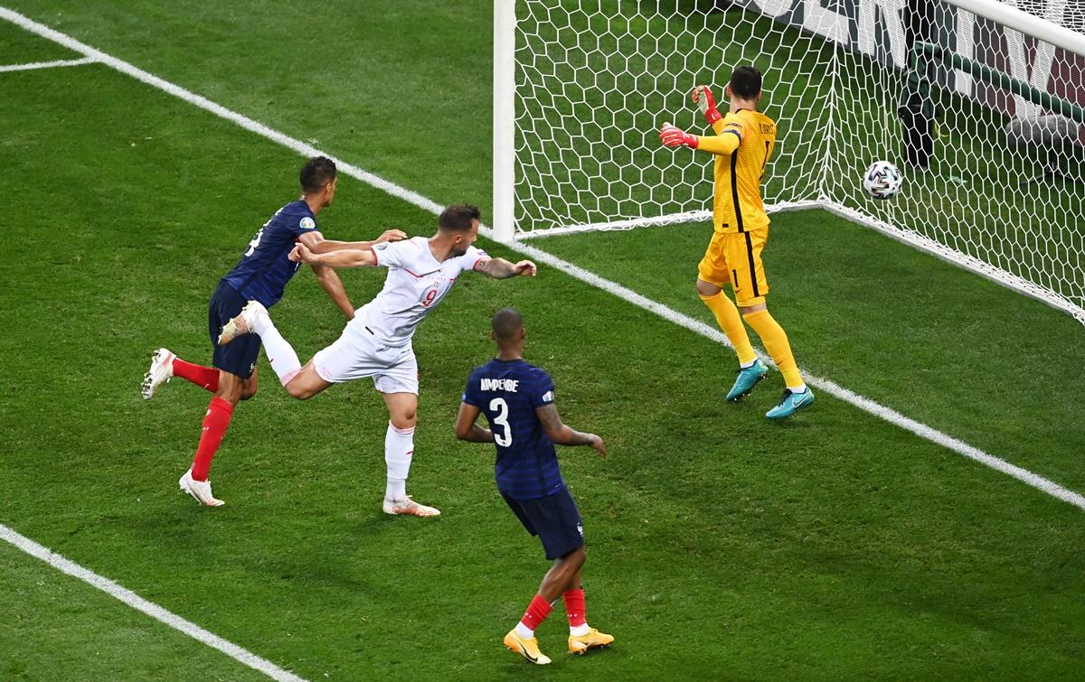 Haris Seferovic scores Switzerland's second goal past France goalkeeper Hugo Lloris