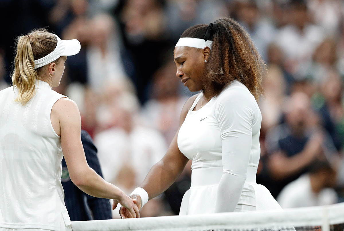 Tearful Serena Williams shakes hands with Belarus' Aliaksandra Sasnovich as she retires from their first round match after sustaining an injury 