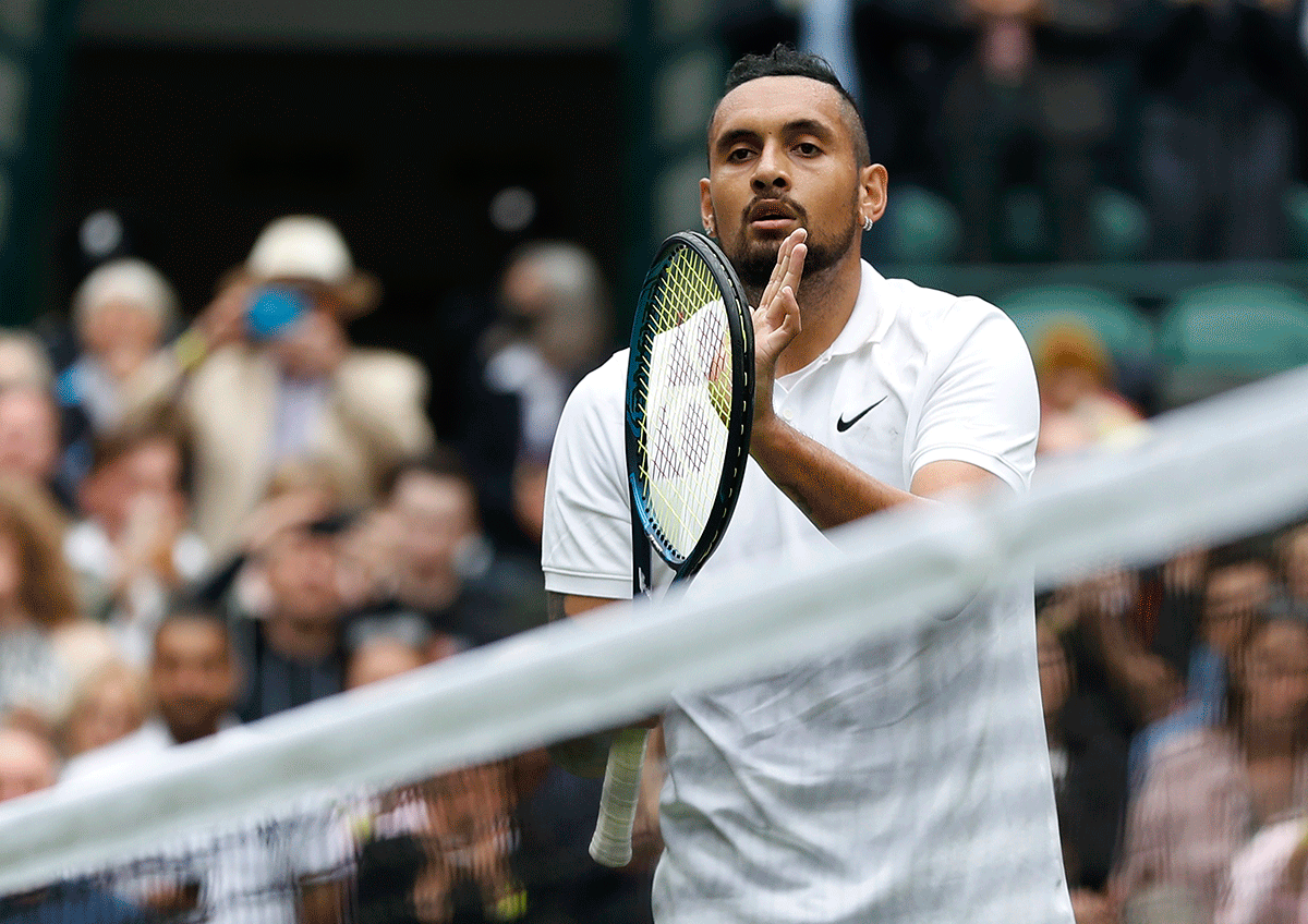 Australia's Nick Kyrgios celebrates winning his first round match against France's Ugo Humbert