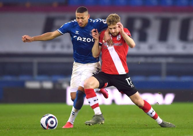Everton's Richarlison in action with Southampton's Stuart Armstrong 