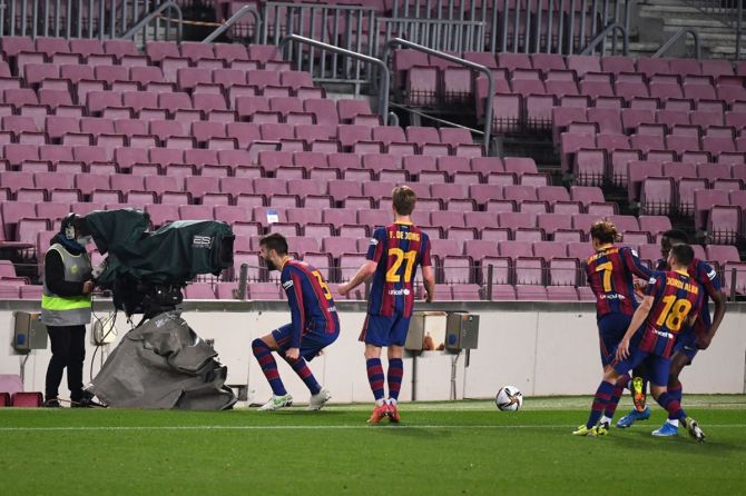 Gerard Pique celebrates after scoring Barcelona's team's second goal.