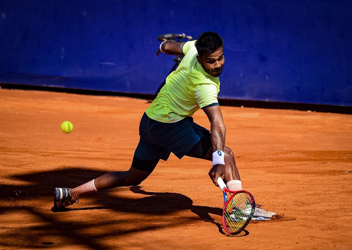 India's Sumit Nagal hits a backhand during his match against Spain's Albert Ramos-Viñolas 