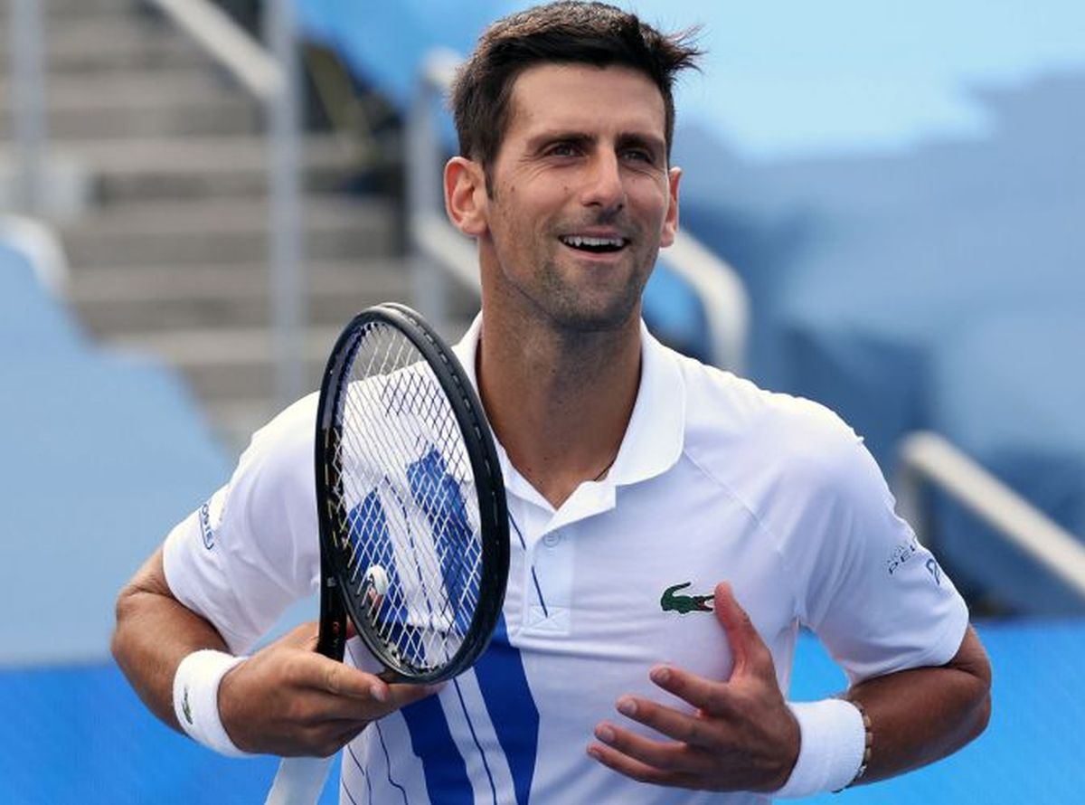 Djokovic lands in Australia, but held up by visa issue