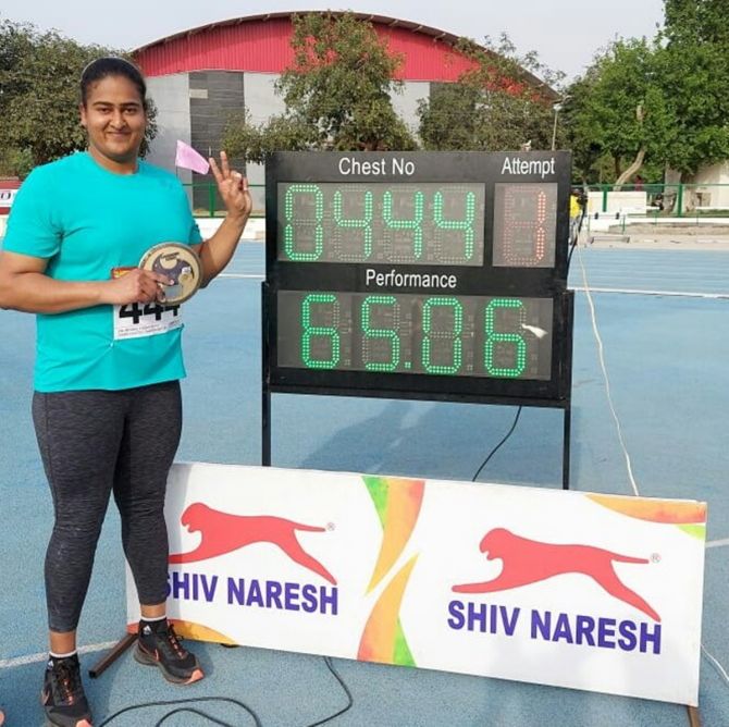 Discus thrower Kamalpreet Kaur celebrates after her National record effort of 65.06 metres in the women’s discus throw at the Federation Cup Senior National Athletics Championships, in Patiala, on Friday.