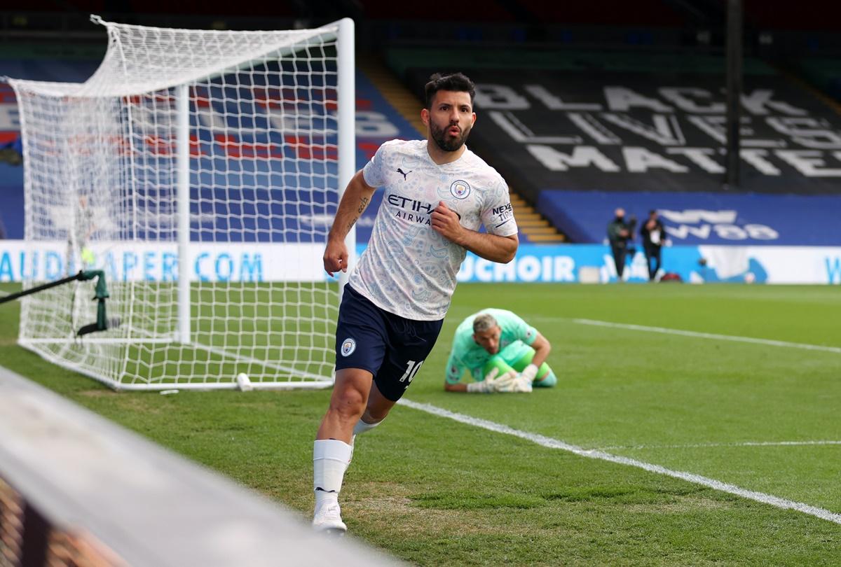 Sergio Aguero does a celebratory run after putting Manchester City ahead in the Premier League match against at Crystal Palace on Saturday.