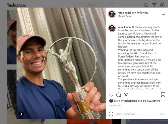 Rafael Nadal is all smiles as he shows off the 2021 Laureus Sportsman of the Year Award 