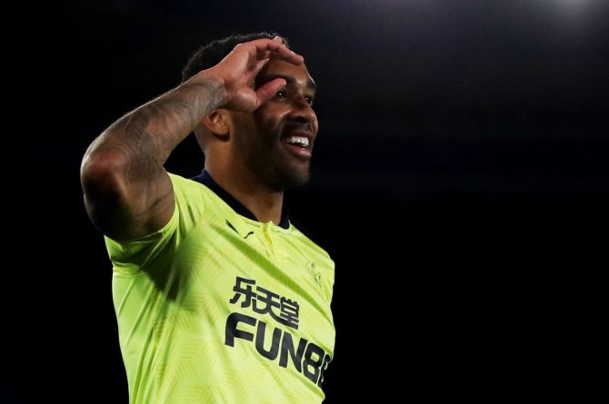Newcastle United's Callum Wilson celebrates scoring their third goal against Leicester City at King Power Stadium in Leicester on Friday
