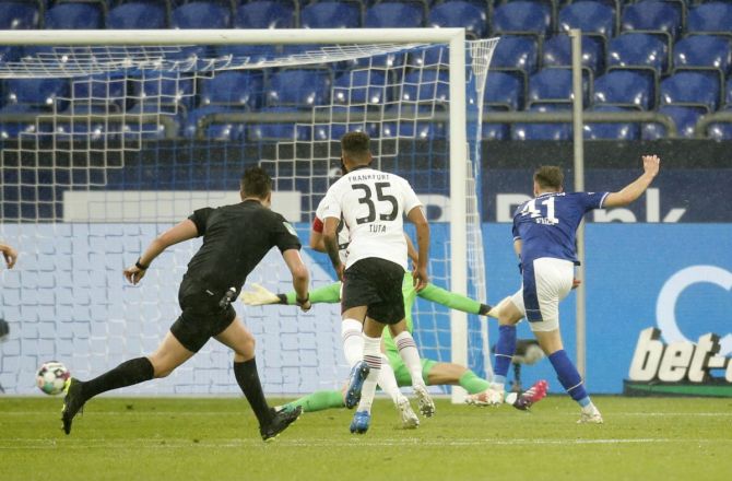 Schalke 04's Florian Flick scores their third goal against Eintracht Frankfurt at Veltins-Arena, Gelsenkirchen, Germany