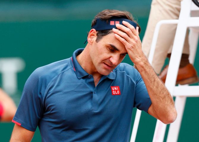 Switzerland's Roger Federer reacts during his round of 16 match against Spain's Pablo Andujar at the Geneva Open at the Tennis Club de Geneva in Switzerland on Tuesday
