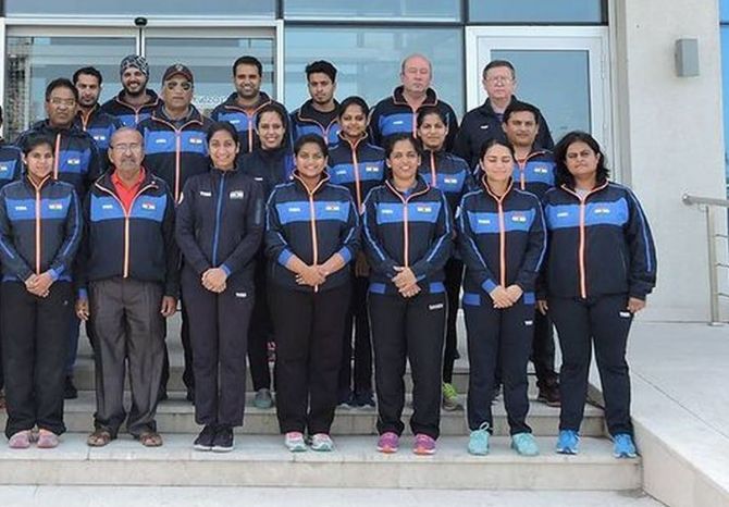 Monali Gorhe (first from right, bottom row) was coach of pistol core team