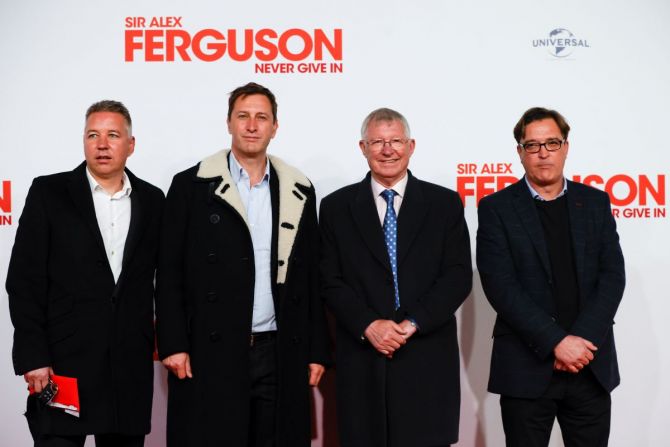 Sir Alex Ferguson and his sons Darren Ferguson, Mark Ferguson and Jason Ferguson attend the world premiere of the documentary "Never Give In" in Manchester on Thursday