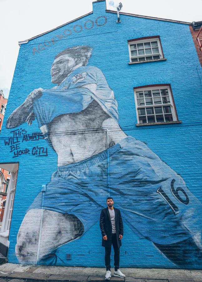 Sergio Kun Aguero was presented with a mosaic inspired by his first-ever Manchester City goal among other honours.	