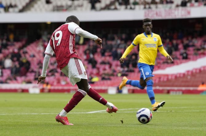 Arsenal's Nicolas Pepe scores their second goal against Brighton at Emirates Stadium 