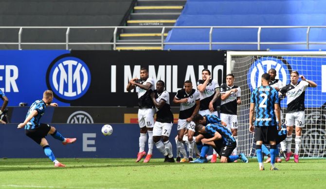 Inter Milan's Christian Eriksen scores their second goal against Udinese