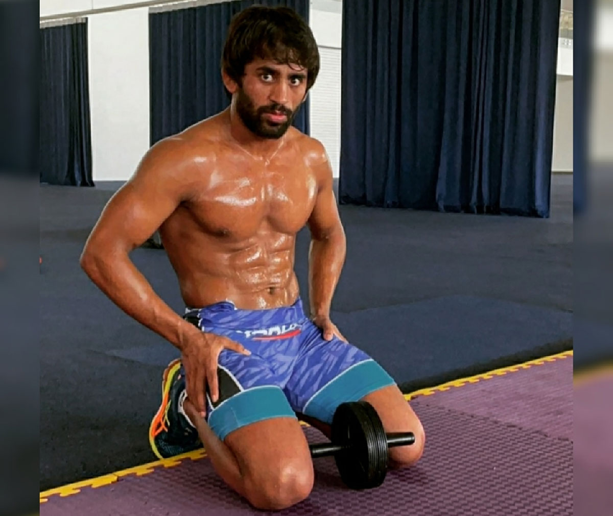 Bajrang trains after recuperating from knee surgery