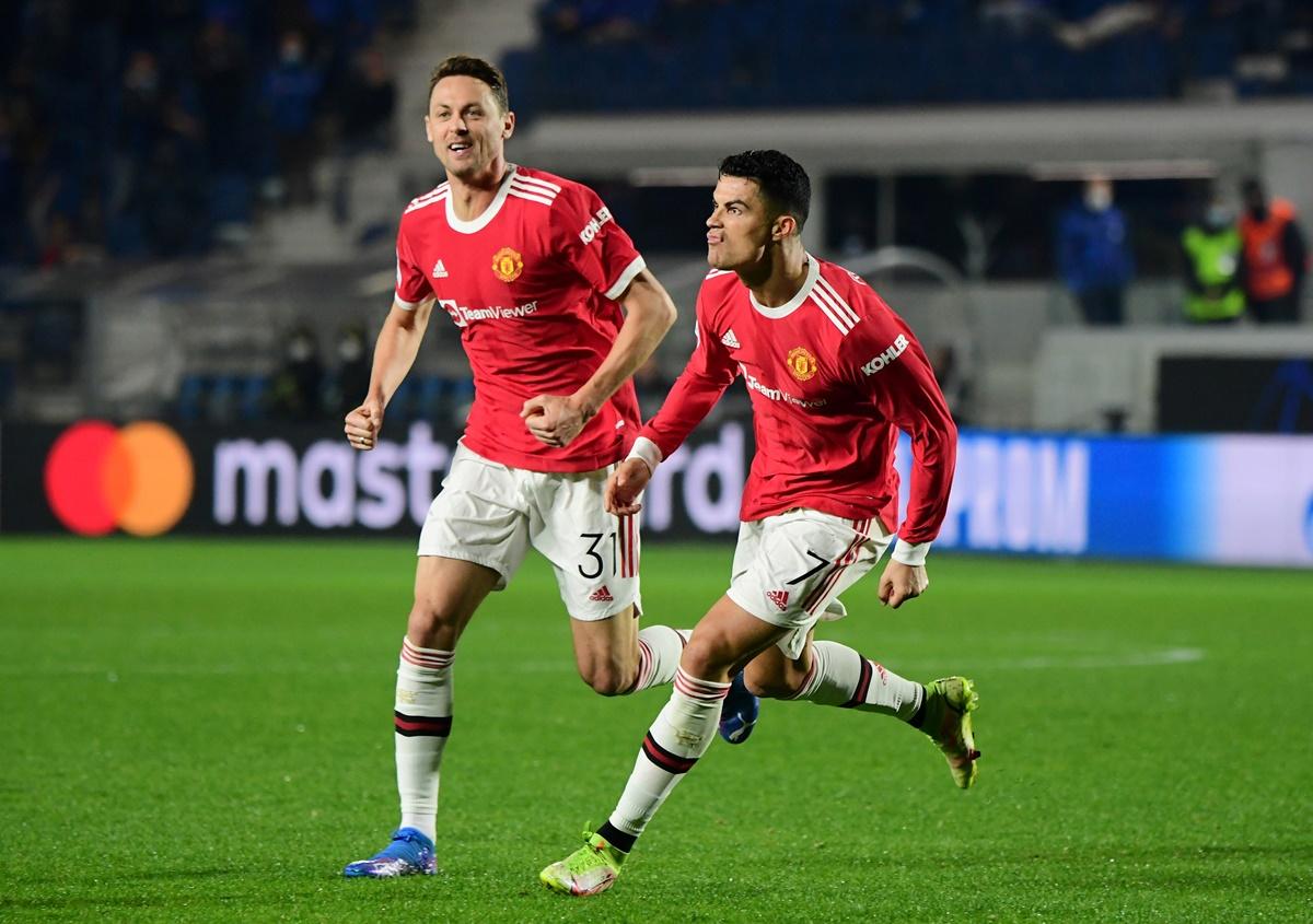 Cristiano Ronaldo celebrates with Nemanja Matic after scoring Manchester United's second goal in the Group F Champions League match against Atalanta, at Stadio Atleti Azzurri, Bergamo, Italy, on Tuesday.