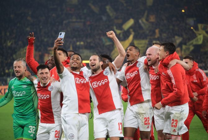 Ajax Amsterdam players celebrate after beating Borussia Dortmund in the Champions League Group C match, at Signal Iduna Park, in Dortmund, Germany.