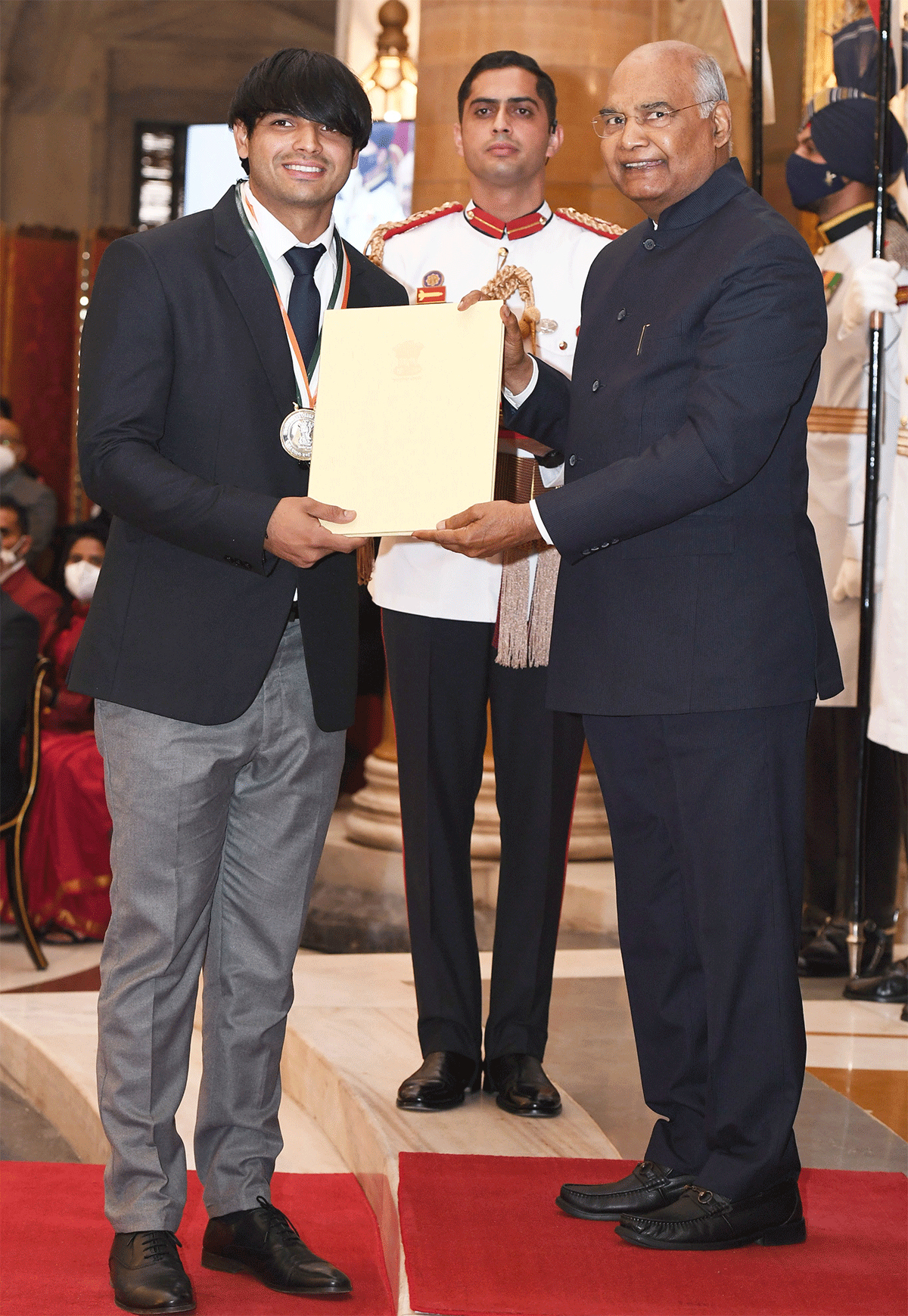 Tokyo Olympics gold medallist Neeraj Chopra receives the Khel Ratna Award from President Ramnath Kovind on Saturday