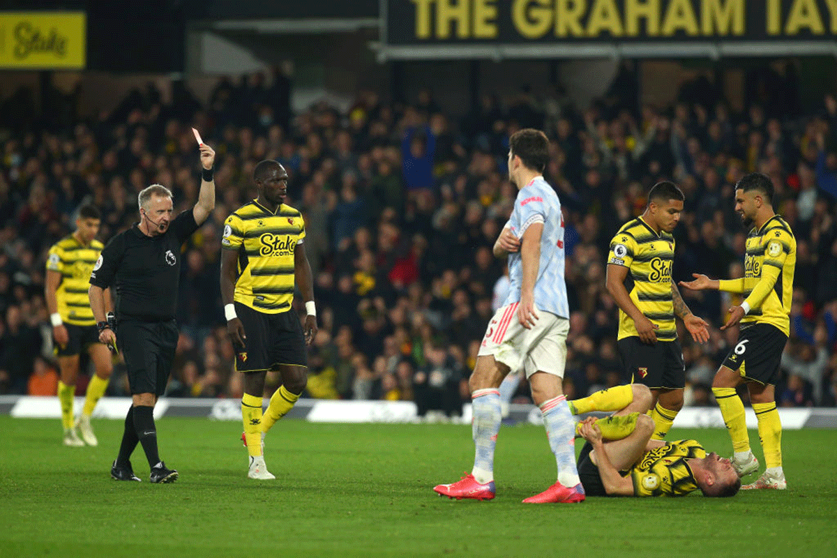 Manchester United's Harry Maguire gets the marching orders from match referee Jonathon Moss 