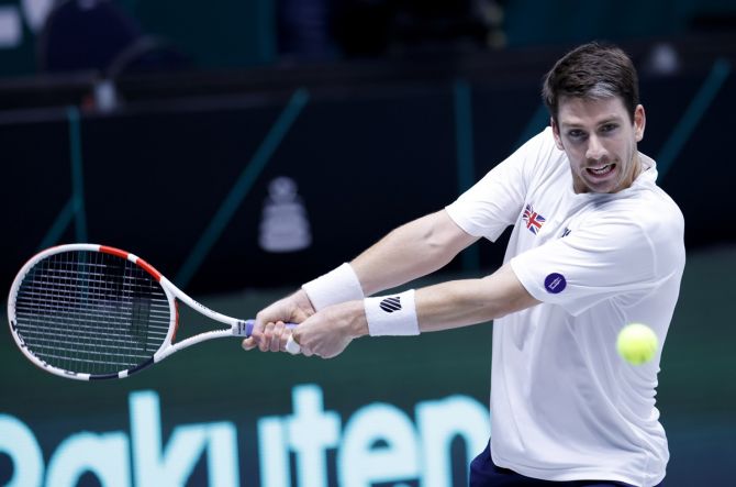Britain's Cameron Norrie in action during his Davis Cup Finals Group C match against France's Arthur Rinderknech, at Olympiahalle, Innsbruck, Austria.