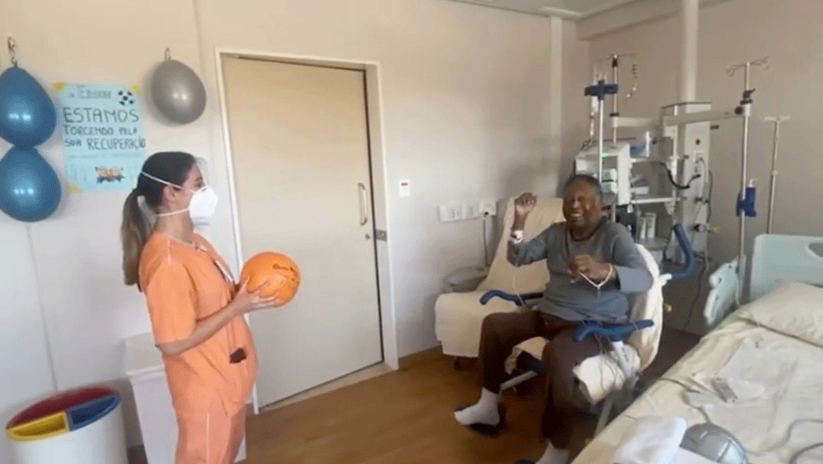 A screen grab of Brazilian soccer legend Pele tossing a ball with physical therapist Kamila in Sao Paulo, Brazil, obtained via Pele's Instagram page
