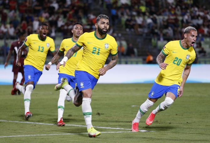Gabriel Barbosa celebrates scoring Brazil's second goal with teammates during the South American World Cup qualifier against Venezuela, at Estadio Olimpico, in Caracas, Venezuela, on Thursday.