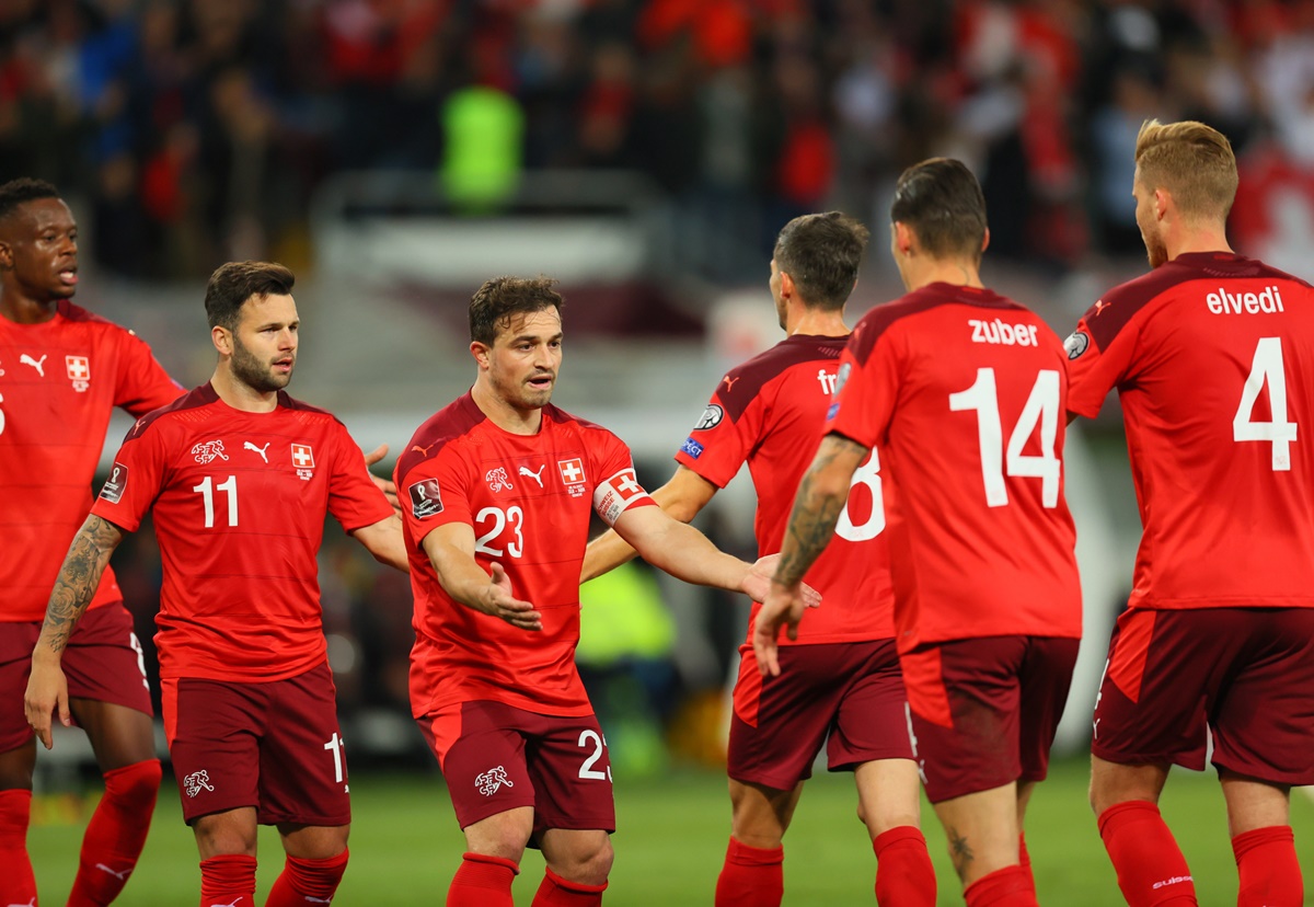 Steven Zuber celebrates scoring Switzerland's first goal with teammates in the UEFA World Cup Group C qualifier against Northern Ireland, at Stade de Geneve, Lancy, Switzerland, on Saturday.